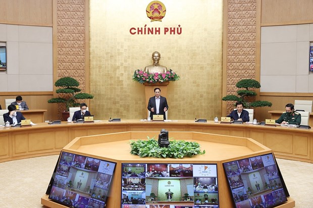 Thủ tướng Pham Minh Ch&iacute;nh chủ tr&igrave; cuộc họp. (Ảnh: Dương Giang/TTXVN)