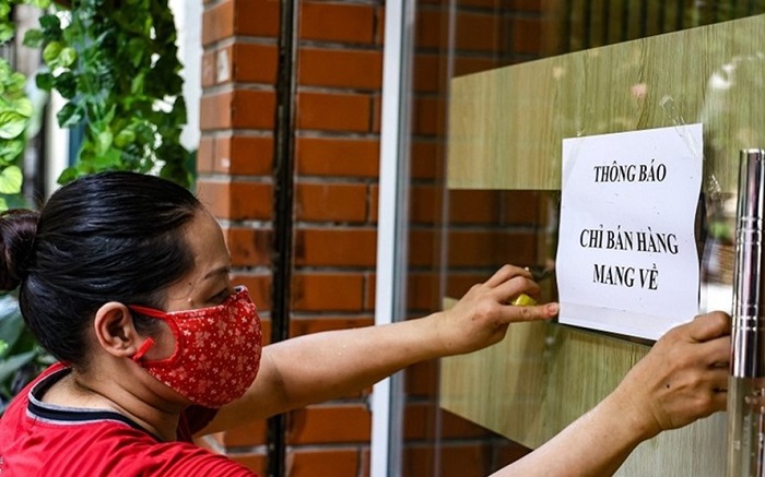 Nhiều địa b&agrave;n ở H&agrave; Nội th&agrave;nh v&ugrave;ng "cam", dừng b&aacute;n h&agrave;ng tại chỗ