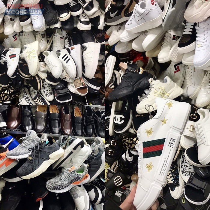 Nhiều đôi giày hàng hiệu tại đây gắn mác Gucci nhưng dưới đế giày lại in chữ Trung Quốc