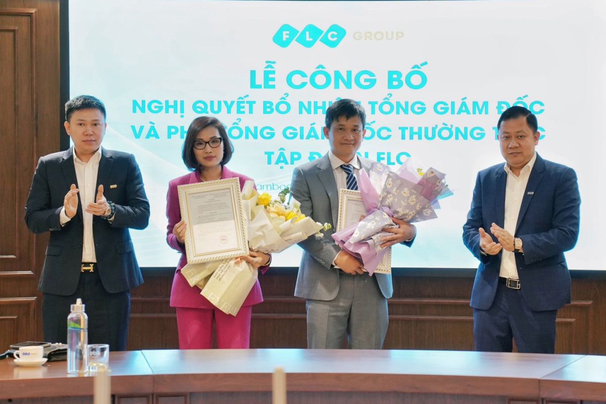 Tổng Giám đốc Lê Tiến Dũng và Phó Tổng Giám đốc thường trực Trần Thị Hương nhận quyết định bổ nhiệm.